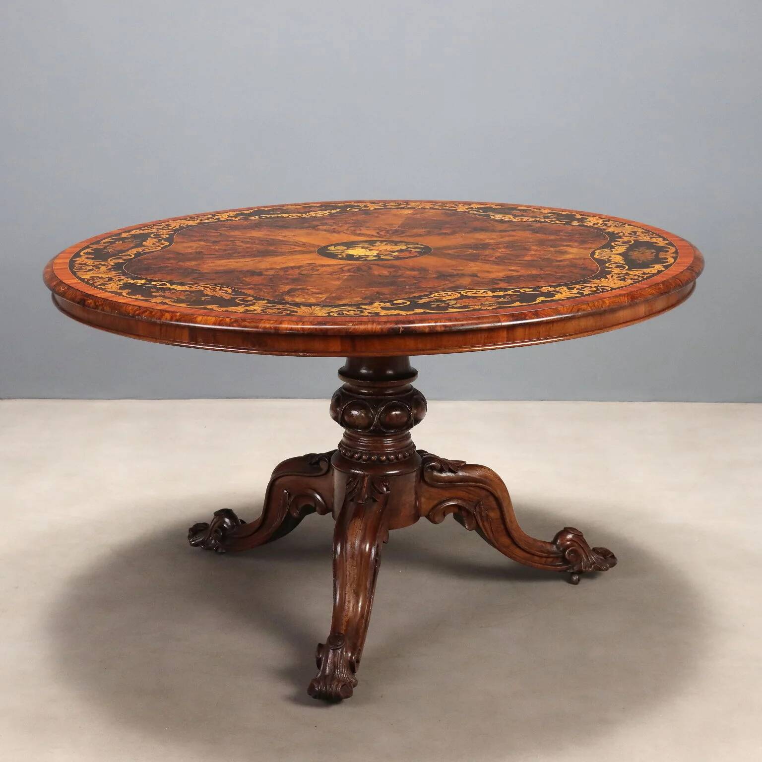 Antique walnut and rosewood table with floral inlays, Netherlands, 19th century.
