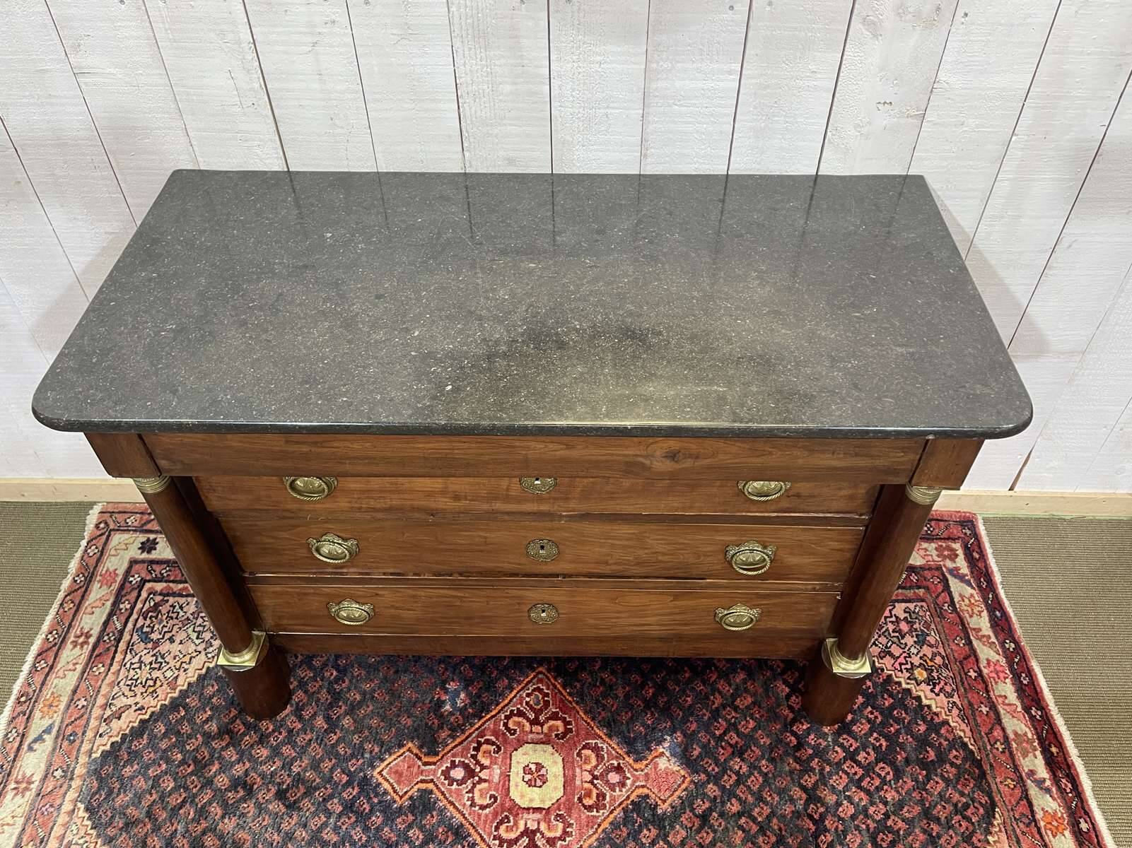 19th century Empire chest of drawers in cherry wood and black marble