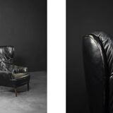 Vintage Danish modern wingback chair in black quilted leather, mid-20th century, 1960s.