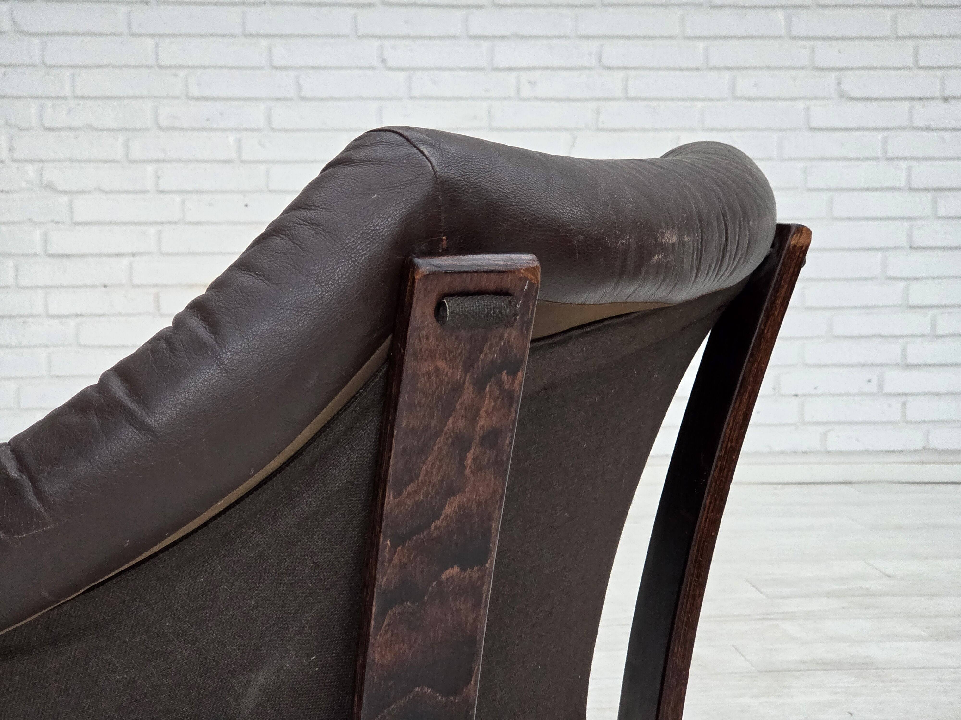 1970s, Scandinavian lounge chair, furniture leather, oak wood.