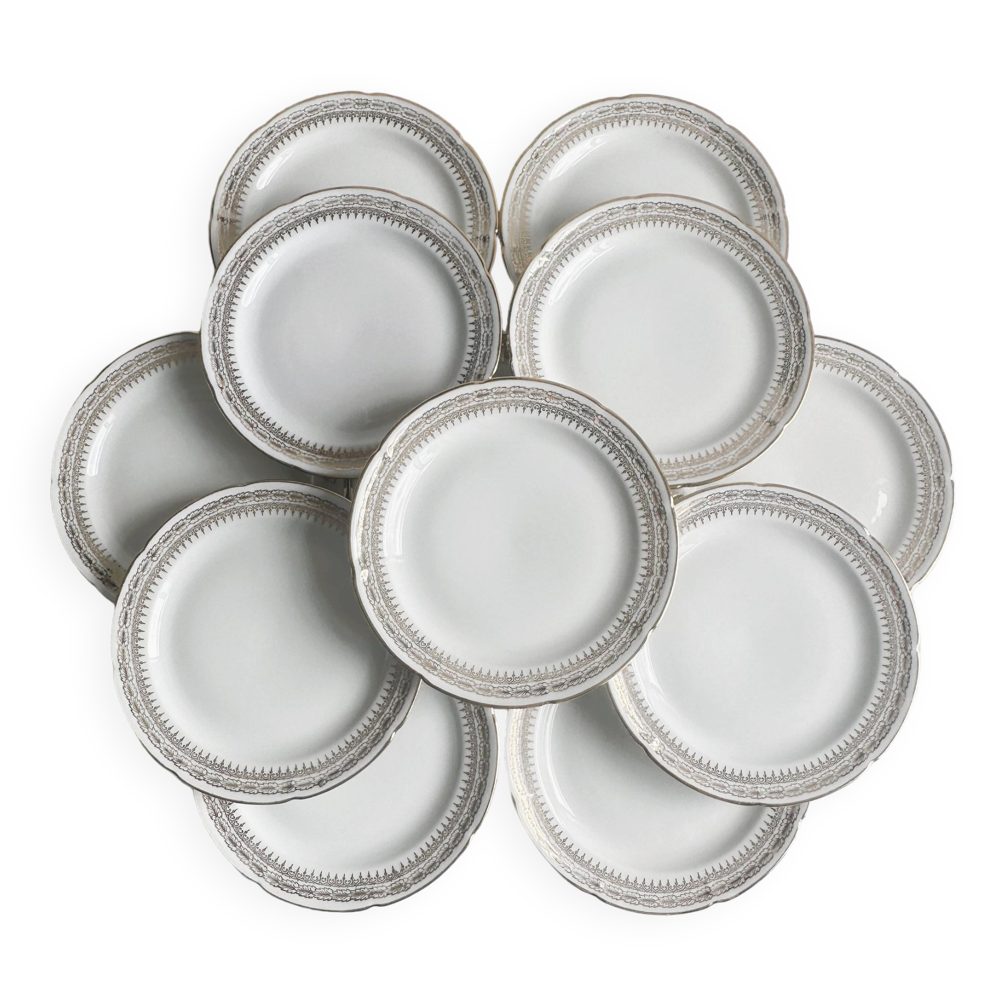 12 Limoges porcelain dessert plates, gold decoration.