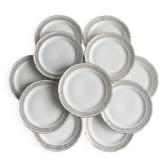 12 Limoges porcelain dessert plates, gold decoration.