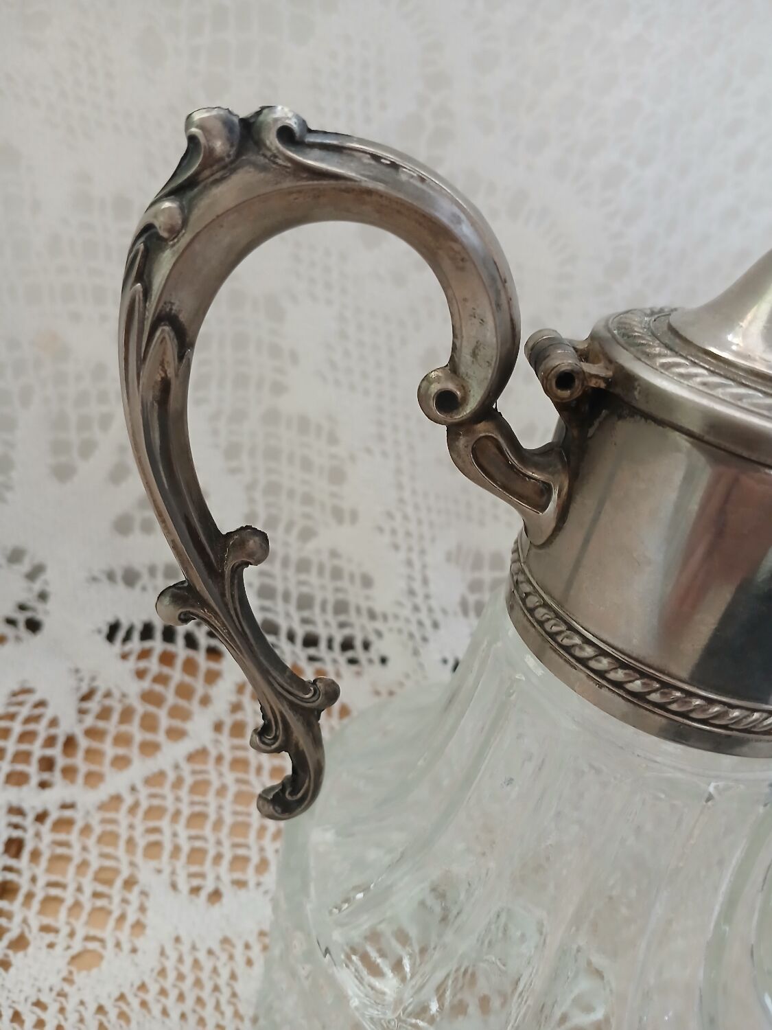 Antique pewter and glass carafe