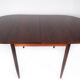 Dining table in rosewood with extension plates, designed by Arne Vodder, 1960s
