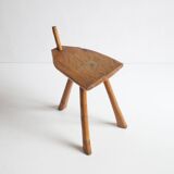 Brutalist tripod stool in carved wood, 1950s