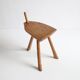 Brutalist tripod stool in carved wood, 1950s