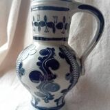 Salt stoneware pitcher with chiseled patterns by M. Schilz