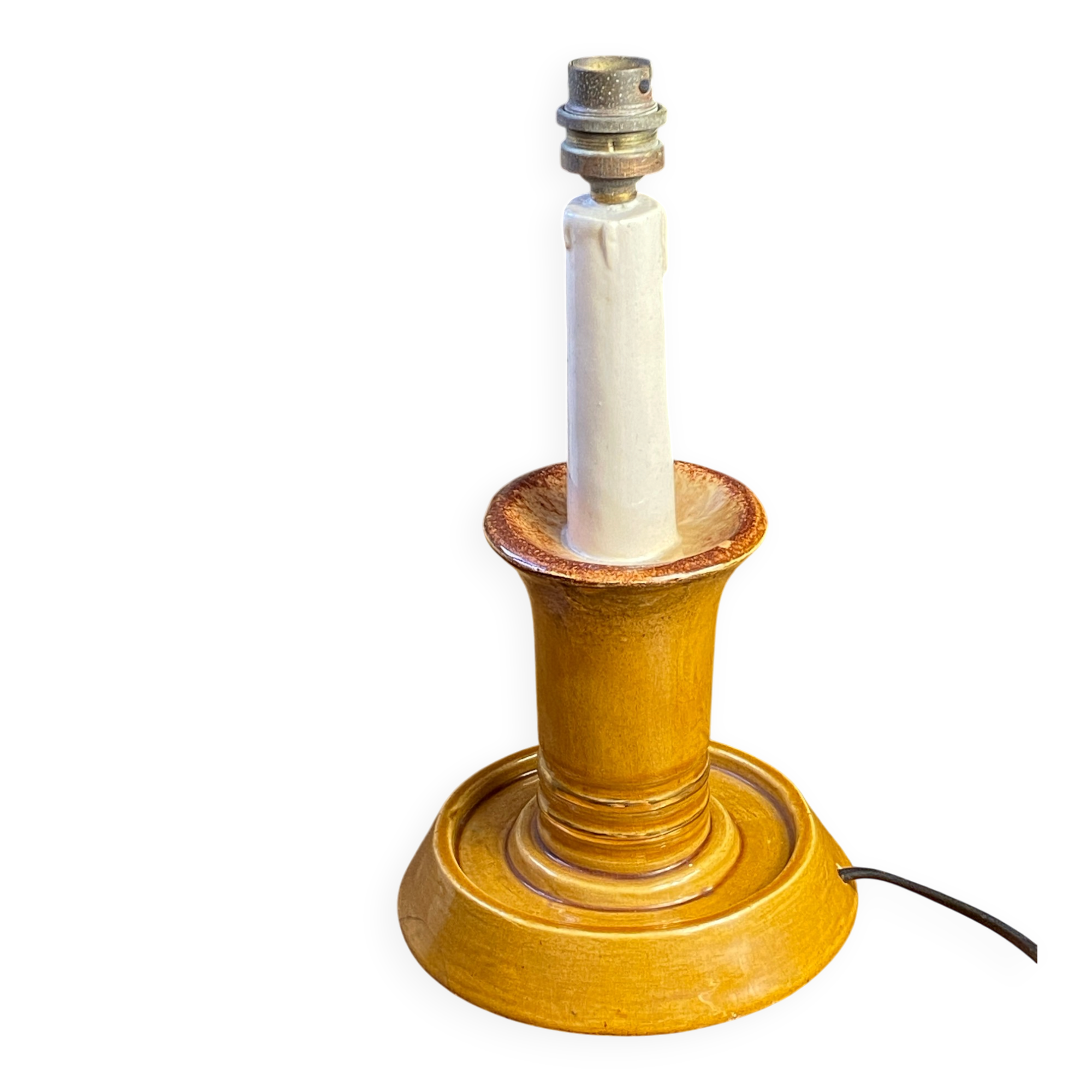 Candle holder-style lamp made entirely of ceramic.