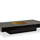 Willy Rizzo. Low table in black lacquered wood and gold brass. 1970s.