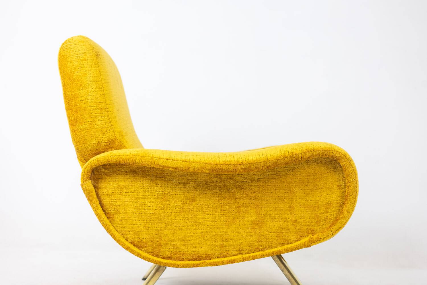Marco Zanuso for Artflex. Yellow and gilded brass armchairs. 1950s.