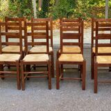 8 solid wood dining chairs with straw seats, farmhouse style