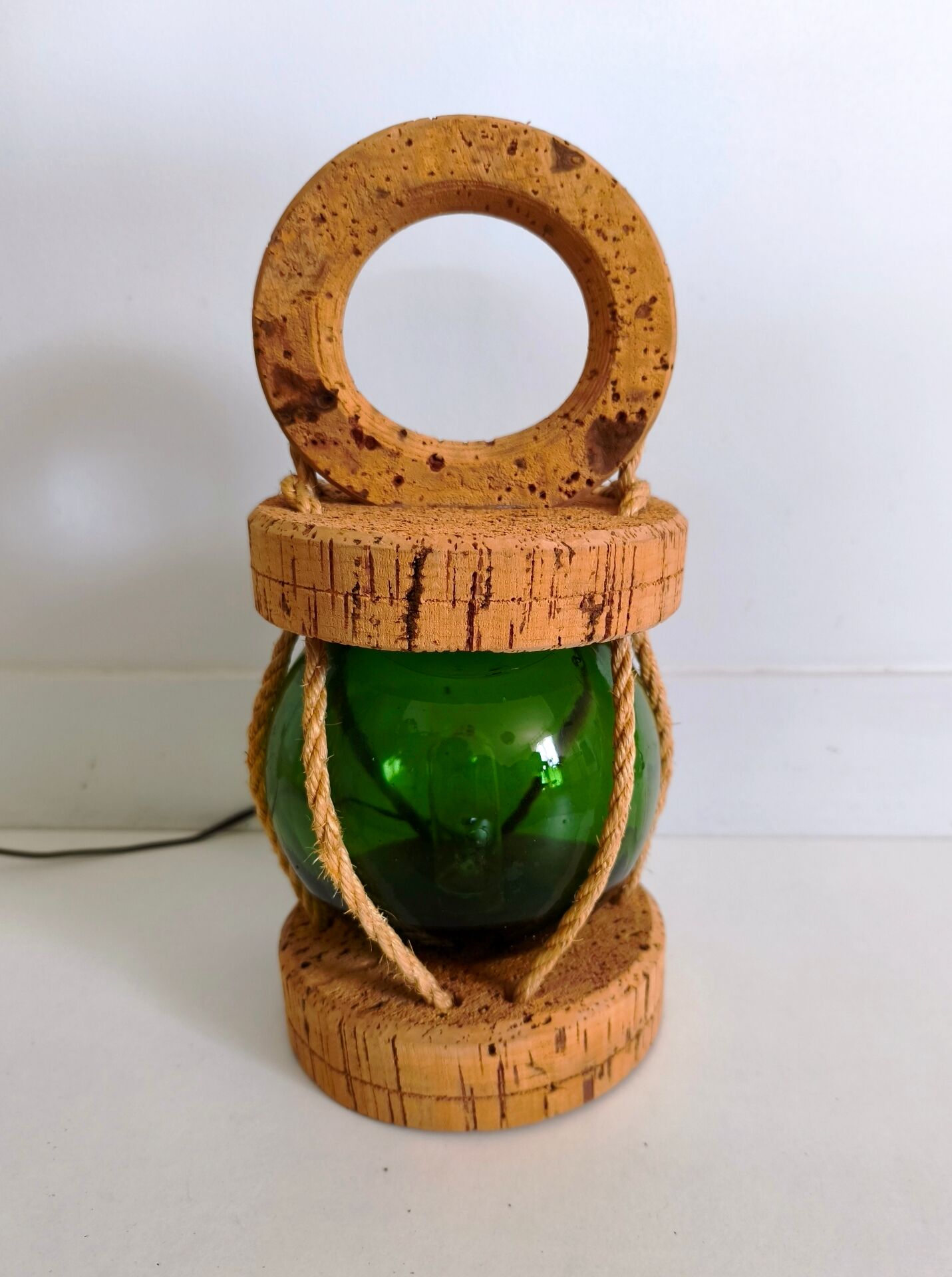 Vintage floating marine lamp made of cork and glass.