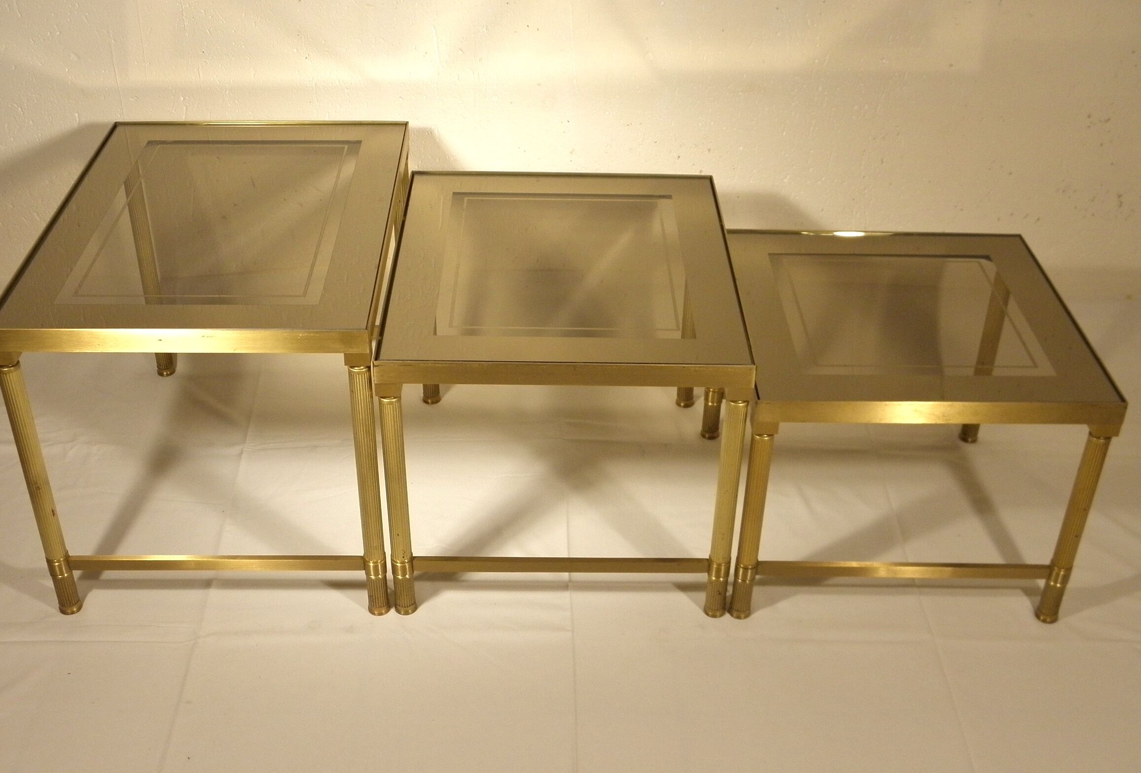 Brass and glass nesting tables