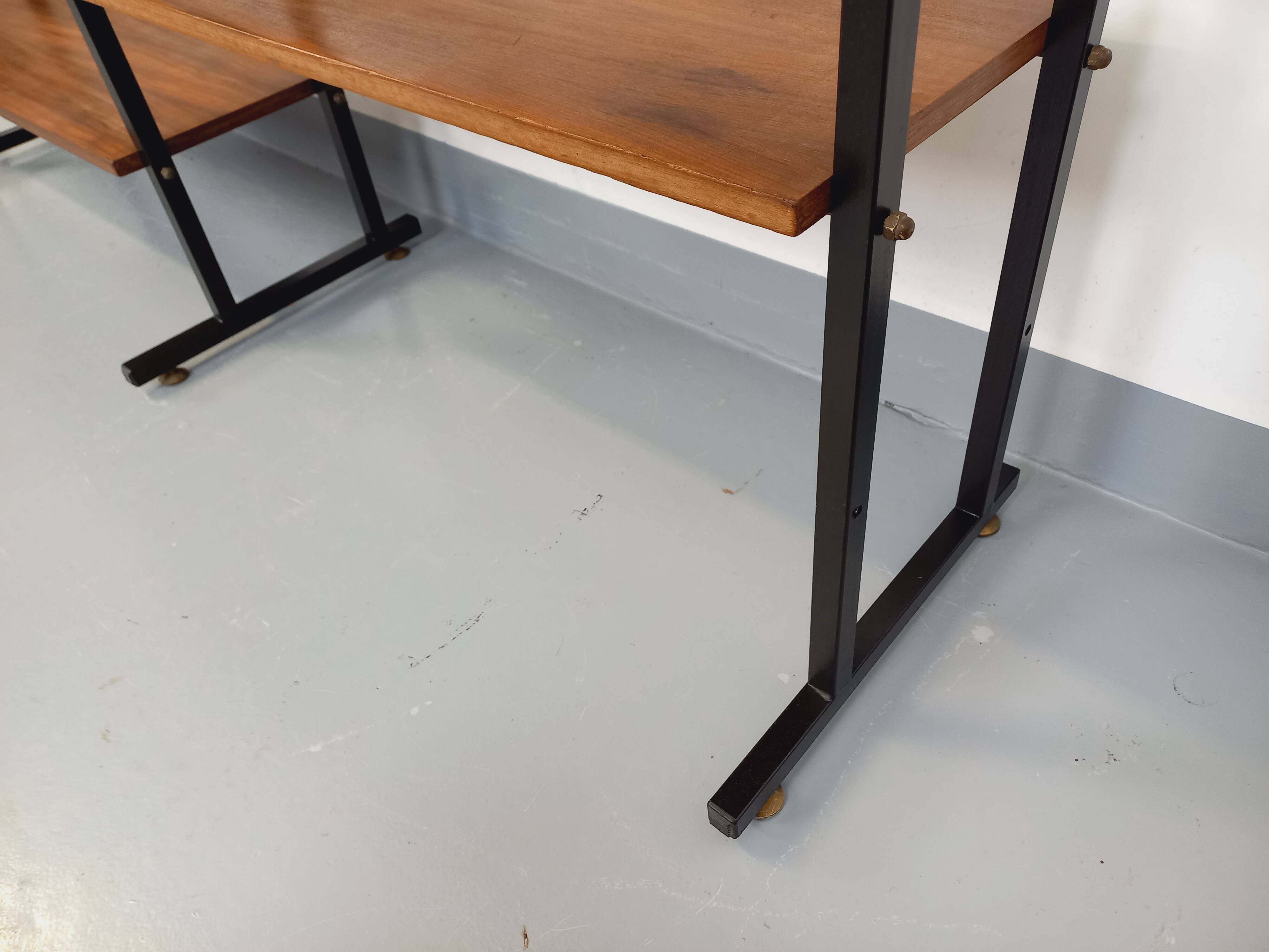 Vintage Italian triple modular bookshelf in teak and metal.