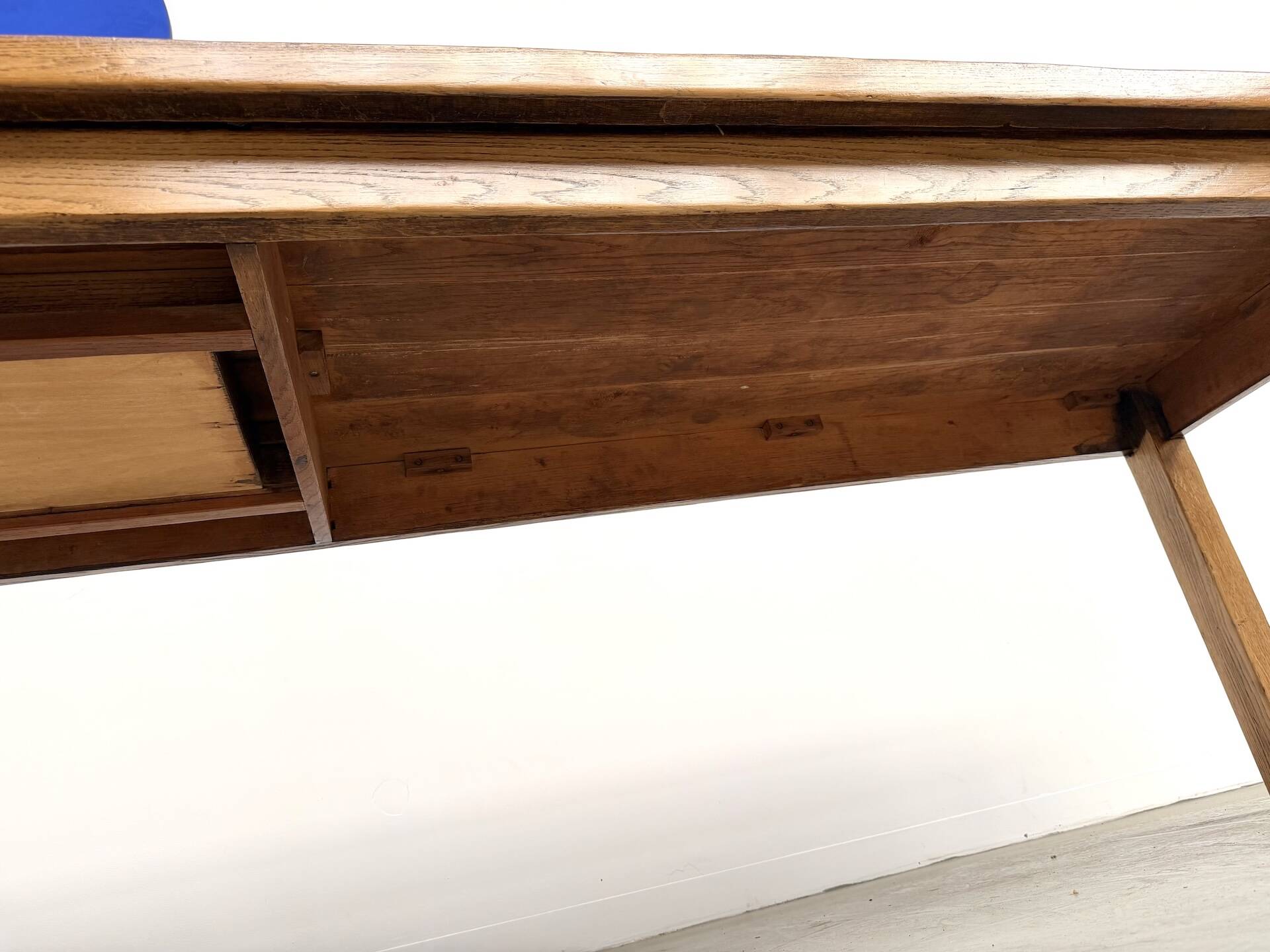 Solid oak farmhouse table, square legs.