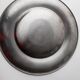 Vintage stainless steel bowl from the 1980s, polished metal with a finely textured surface, timeless elegant design, retro table decoration, noble gift idea.