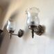Pair of wall sconces in bronze with opaline glass tulips.
