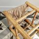 Vintage low stool in wood, honey yellow tones – Woven seat