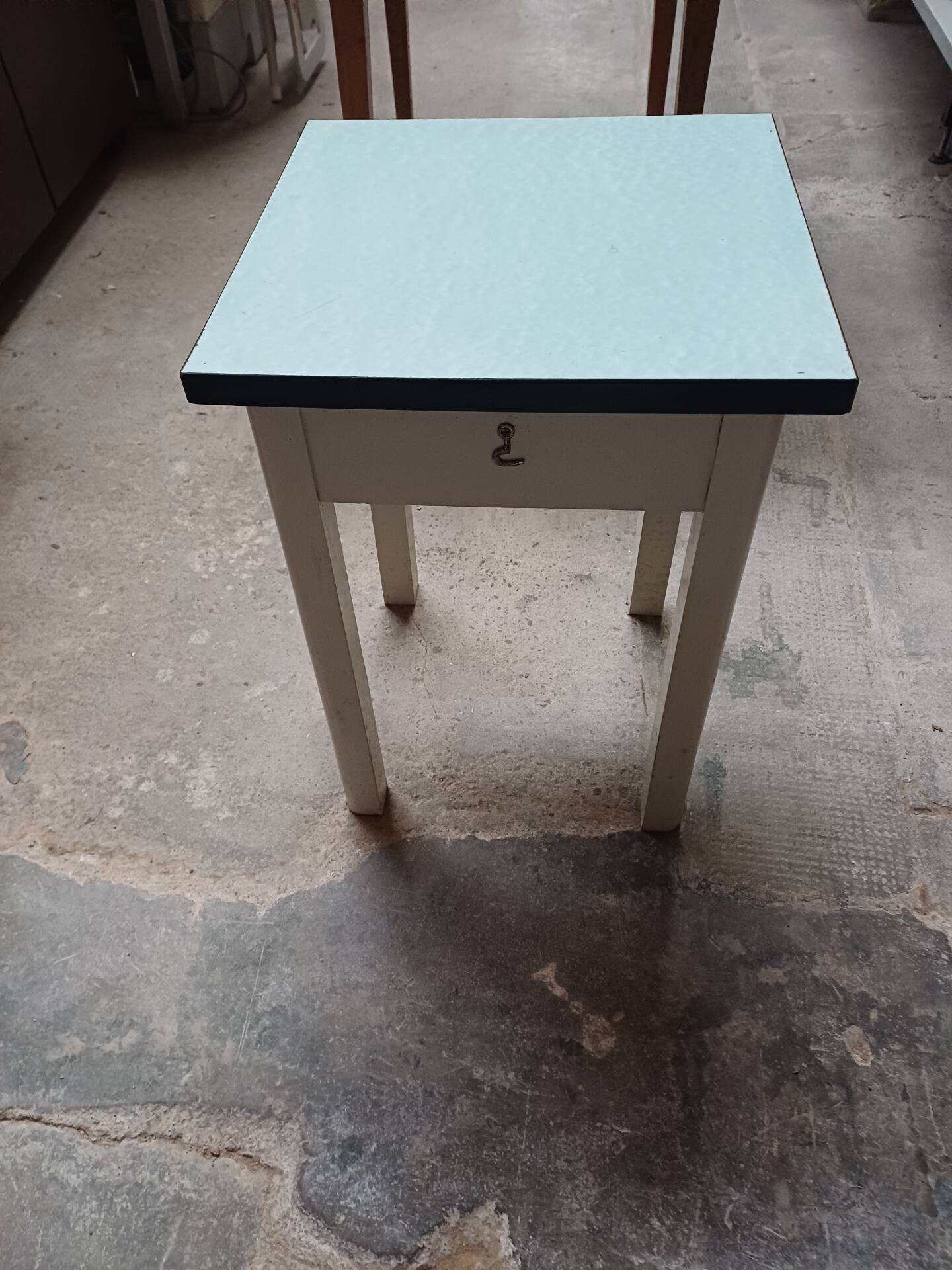 Formica table with tapered wooden legs + stool