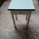 Formica table with tapered wooden legs + stool
