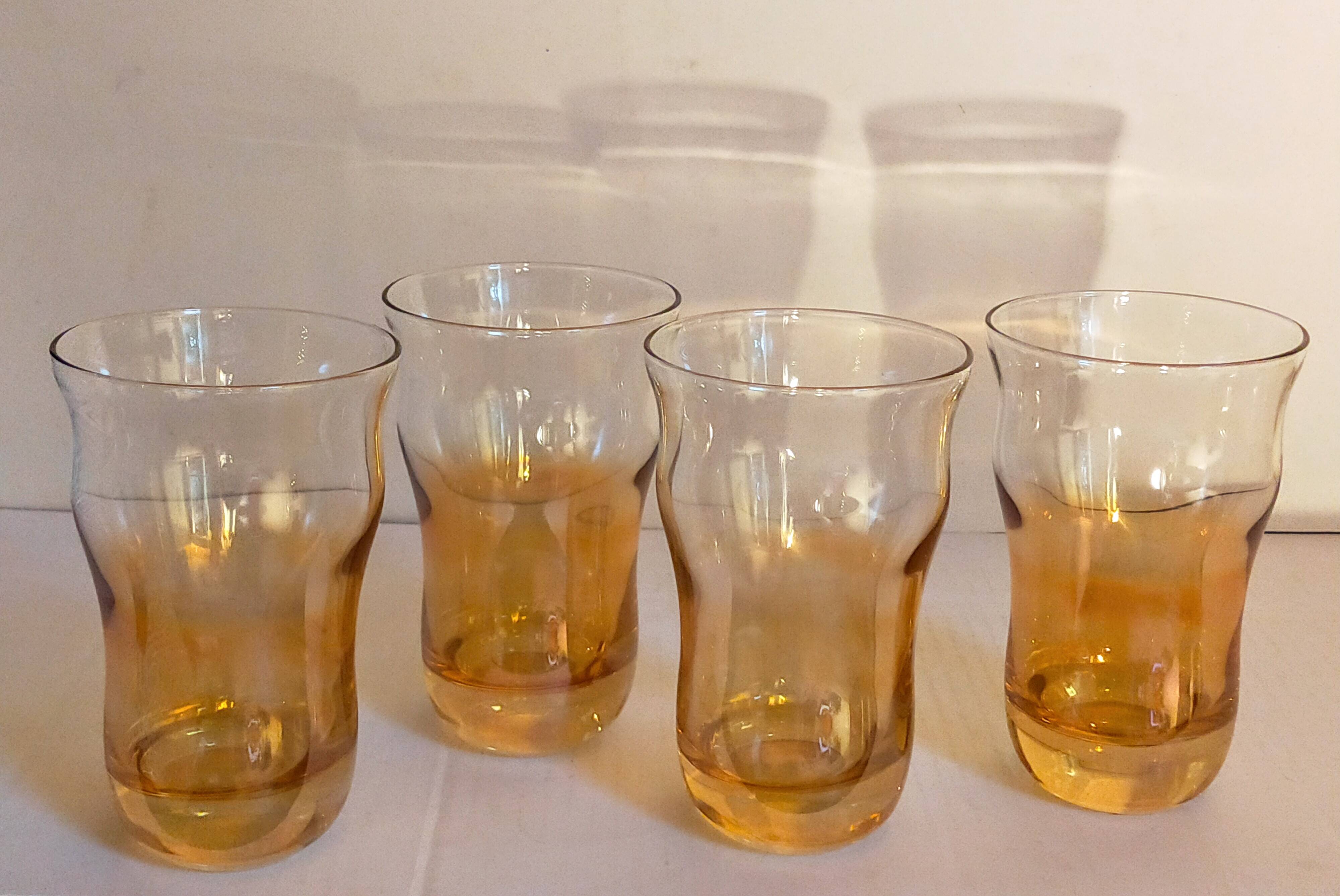 Four iridescent honey blown glass glasses