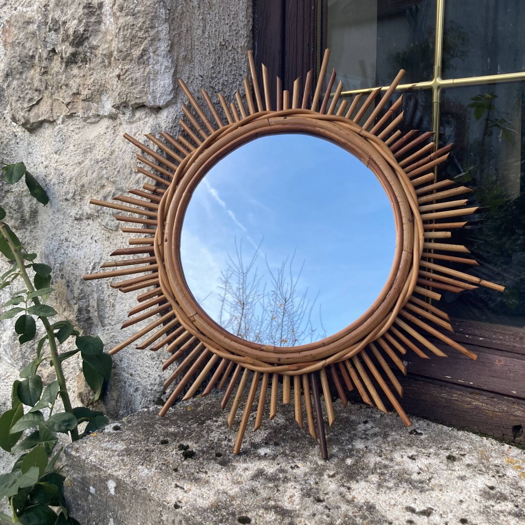 Vintage rattan sun mirror