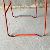 4 red design chairs