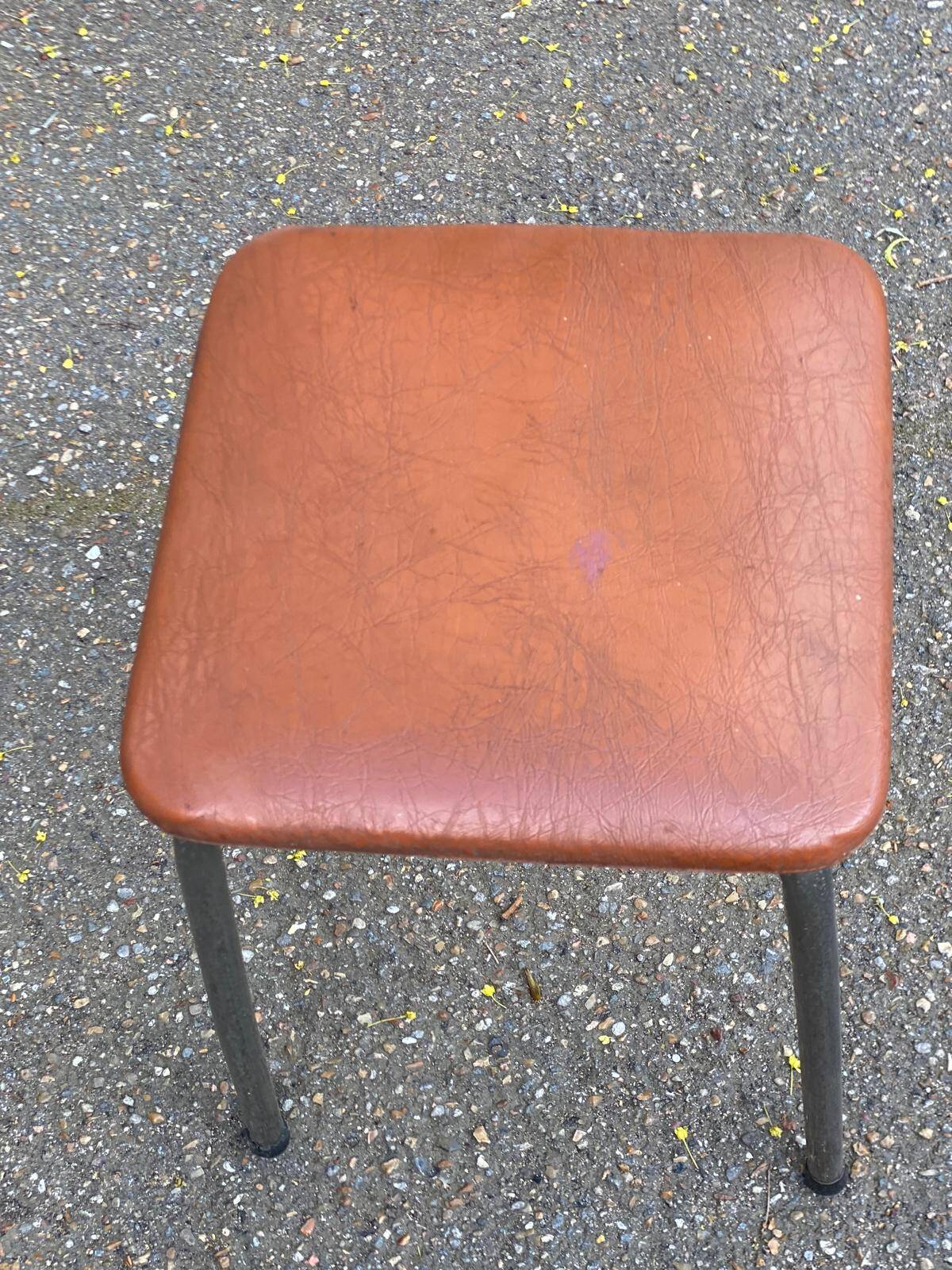 Vintage square stool in steel and brown leather.