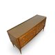 Veneered burl walnut chest of drawers with light warm brown glass top