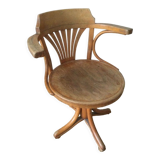 Swivel wooden armchair