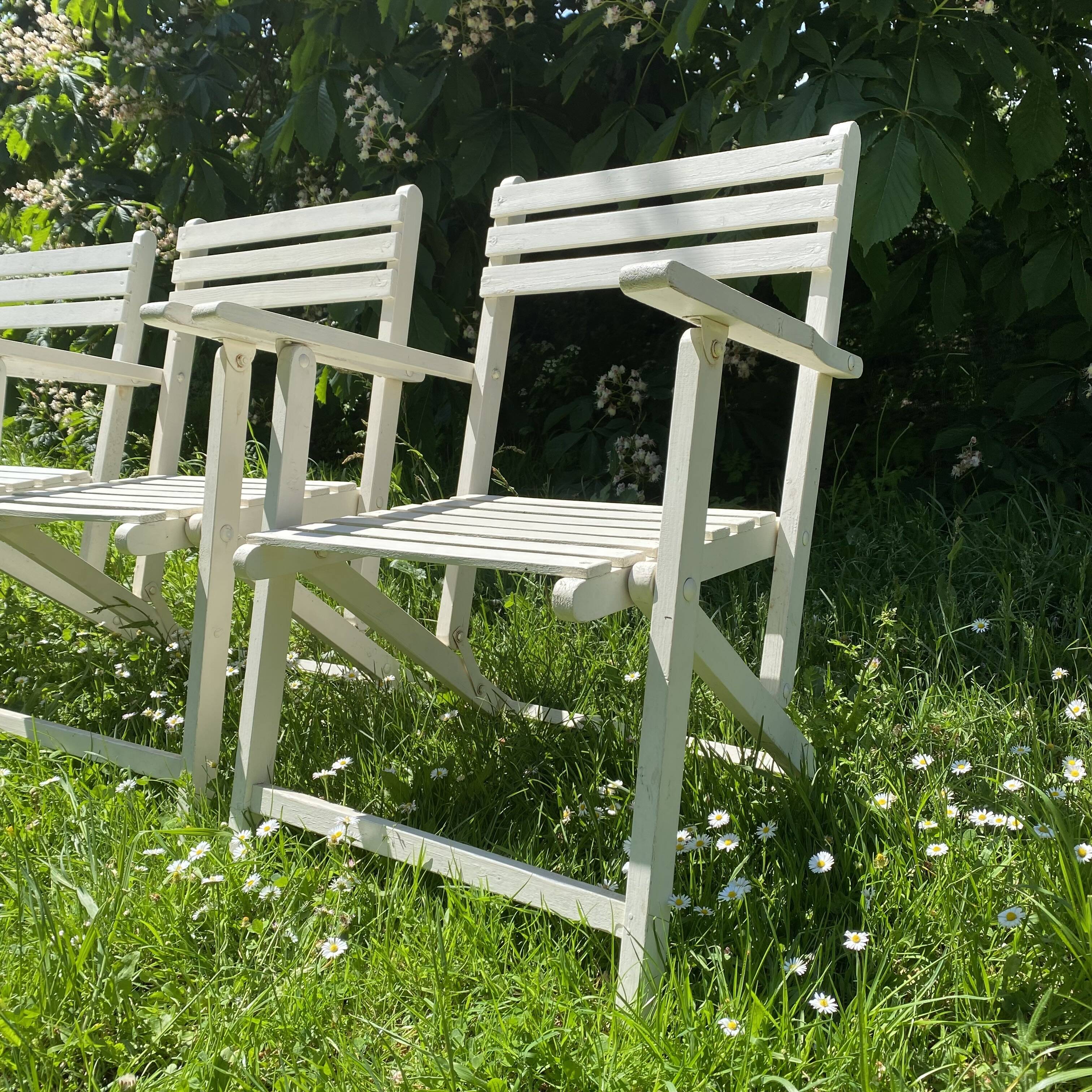 Folding slatted garden armchairs