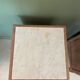 Sandblasted bedside table with white marble