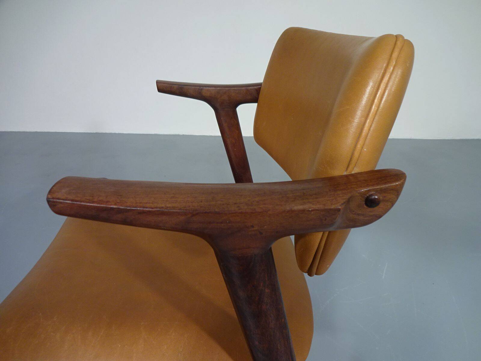 Rosewood and leather armchair from GM, 1960s