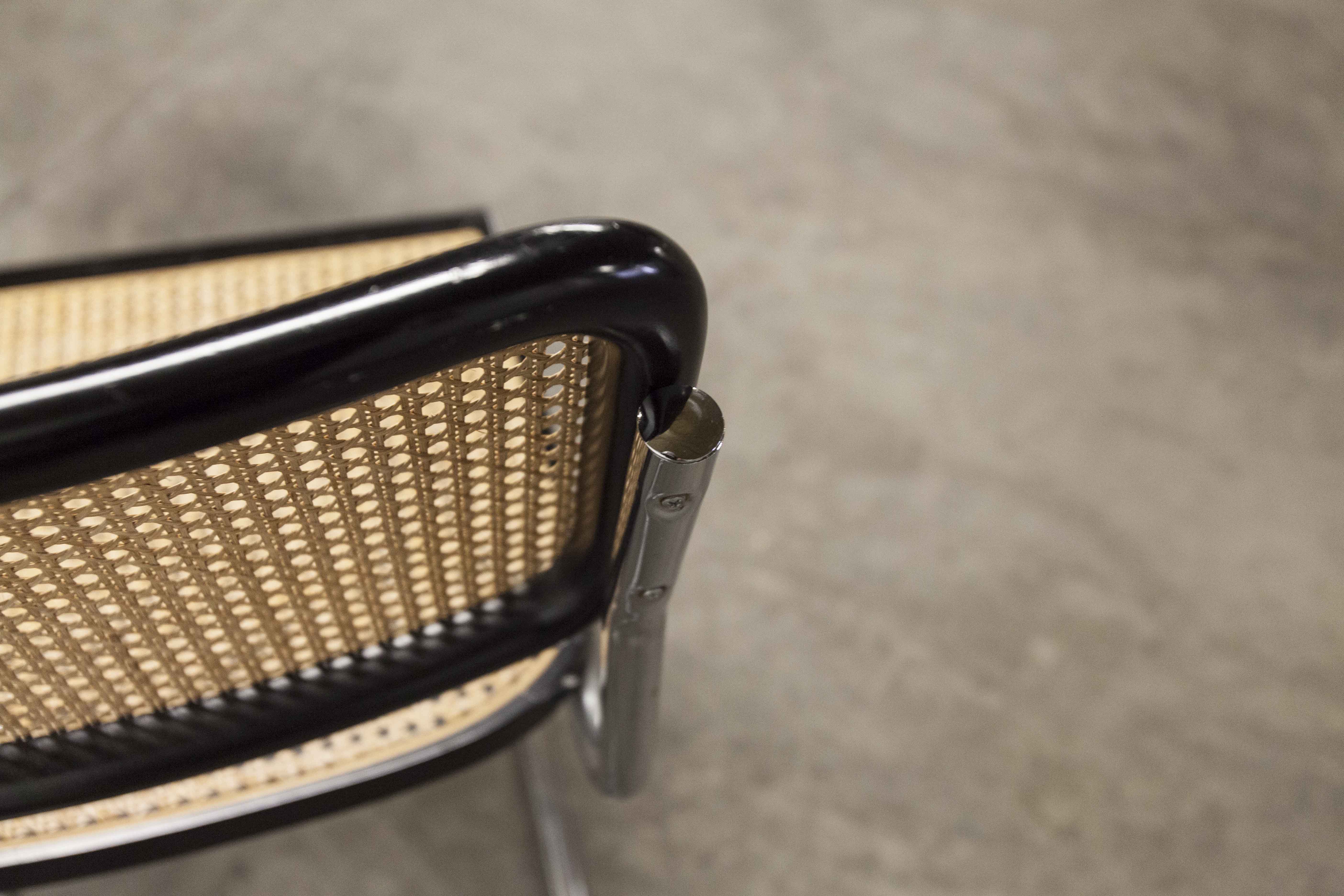 Pair of black Breuer b32 chairs and cannage