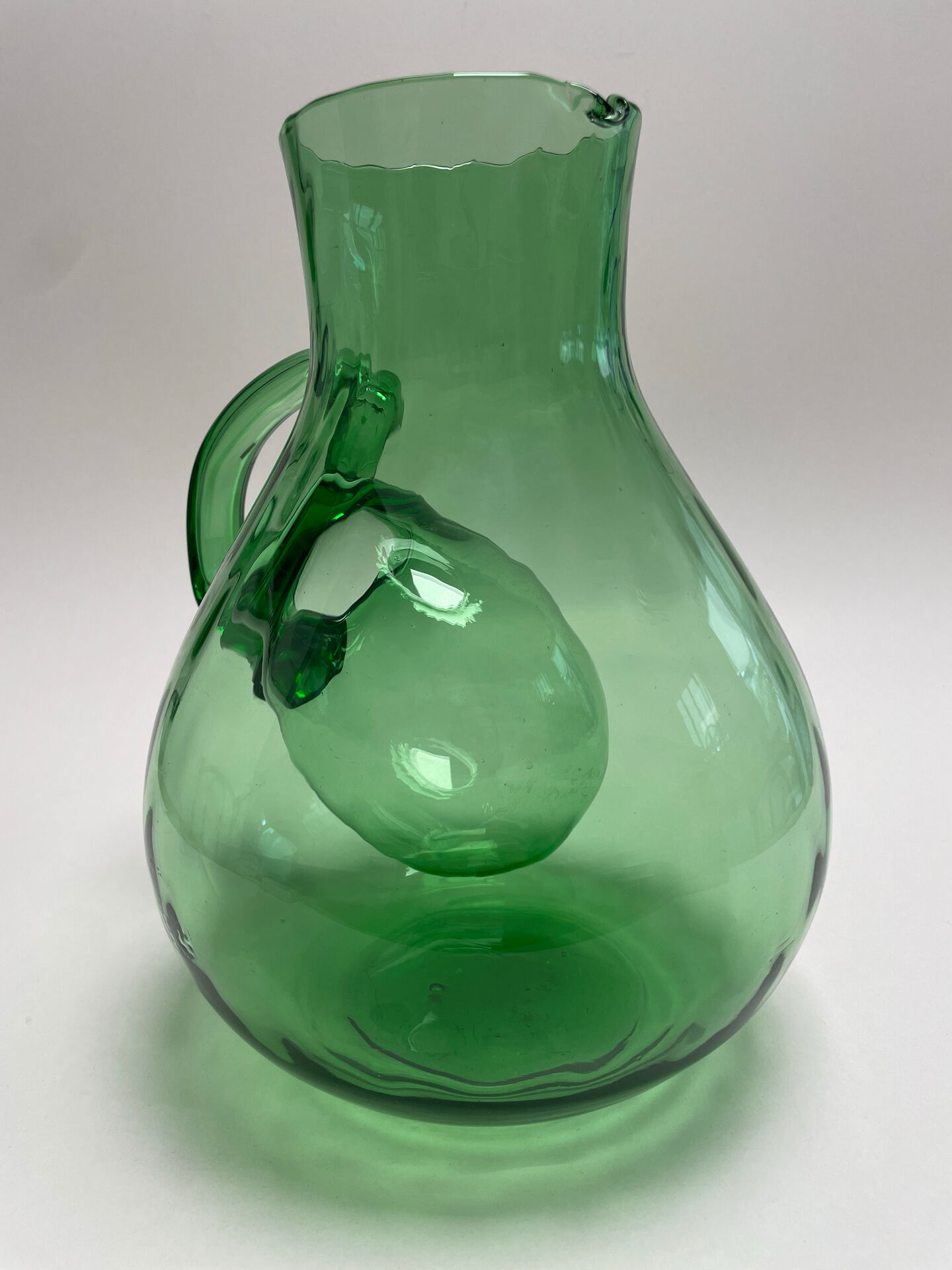 Large green glass cooling jug