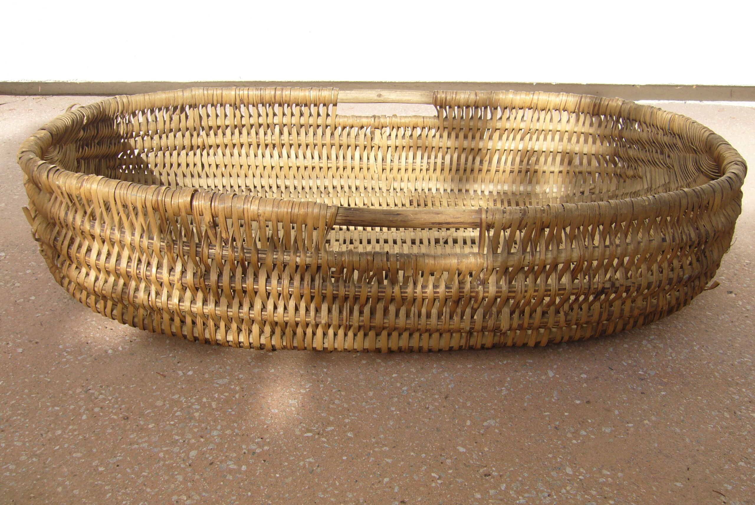 Old wicker laundry basket