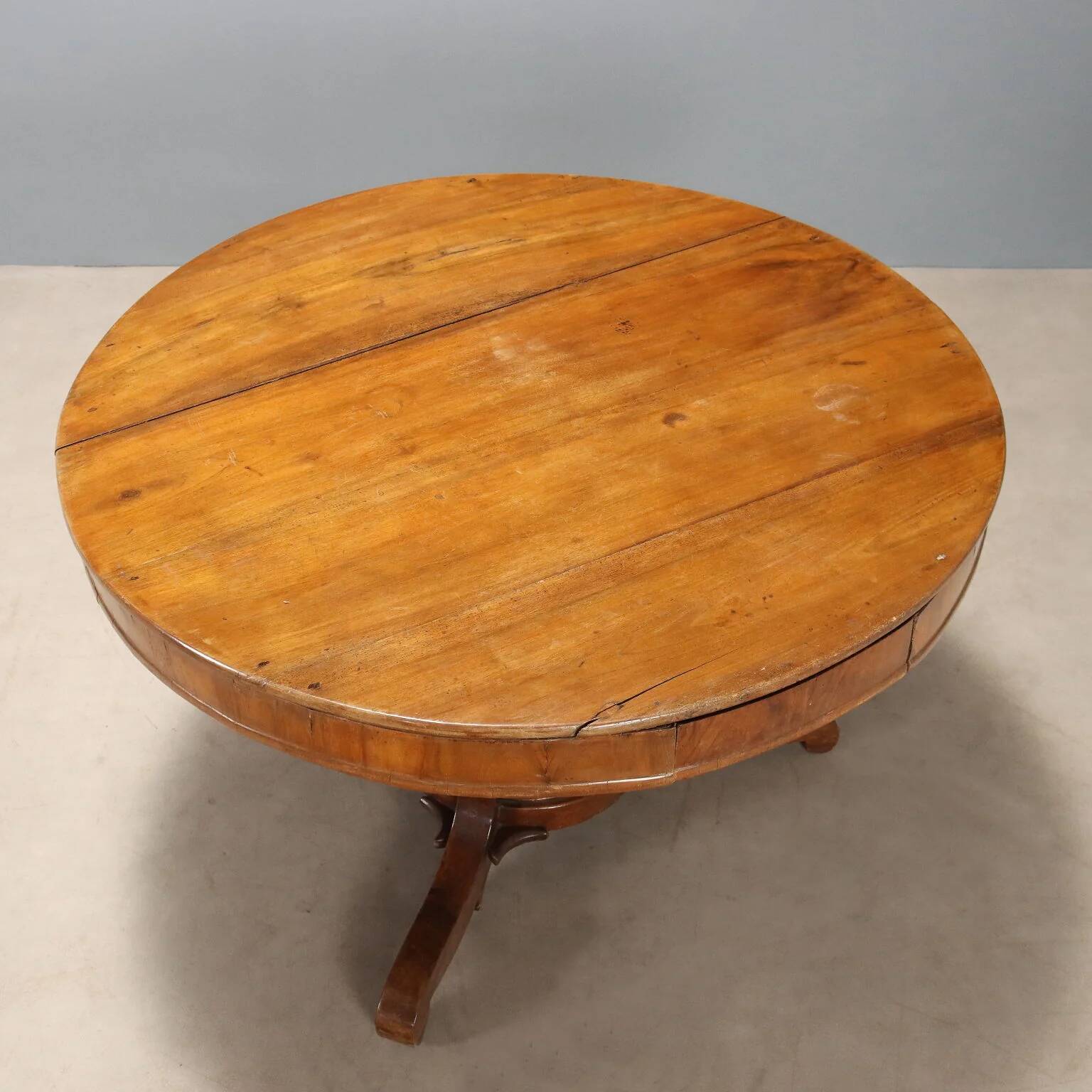Antique walnut round table with drawers, Italy, 19th century