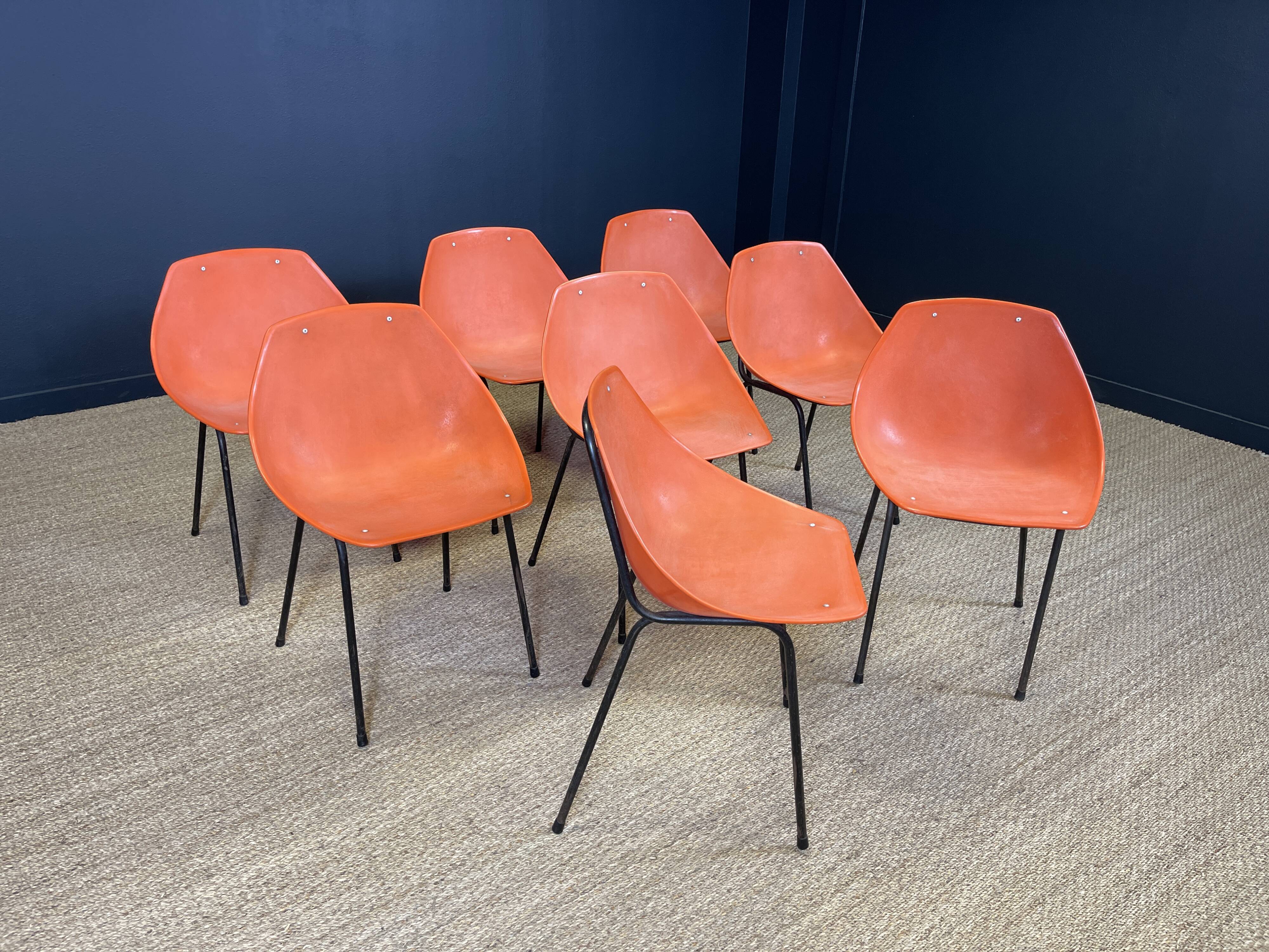 Set of 8 orange Guariche chairs