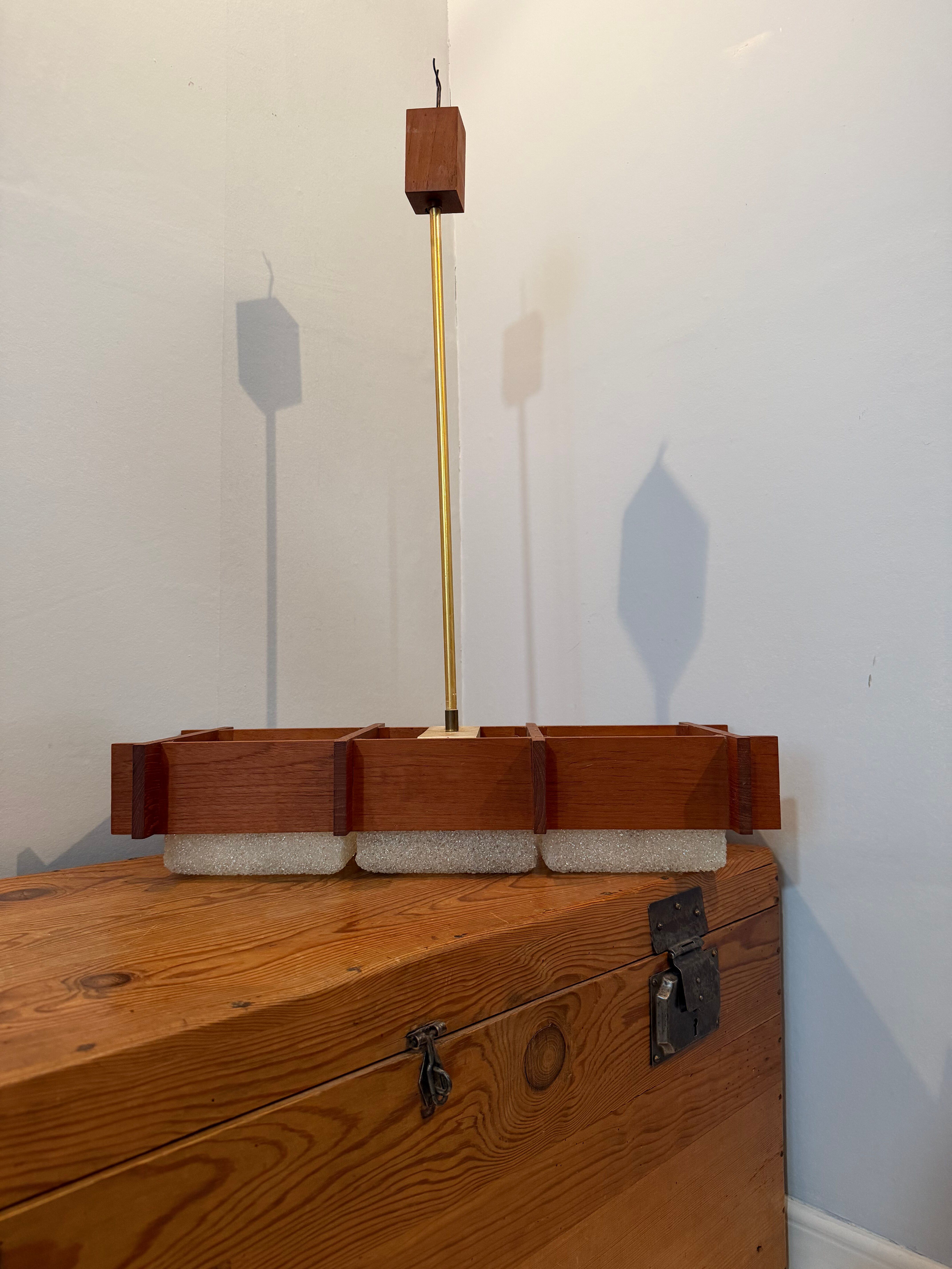 Scandinavian suspension design in teak and vintage perspex from the 1970s.