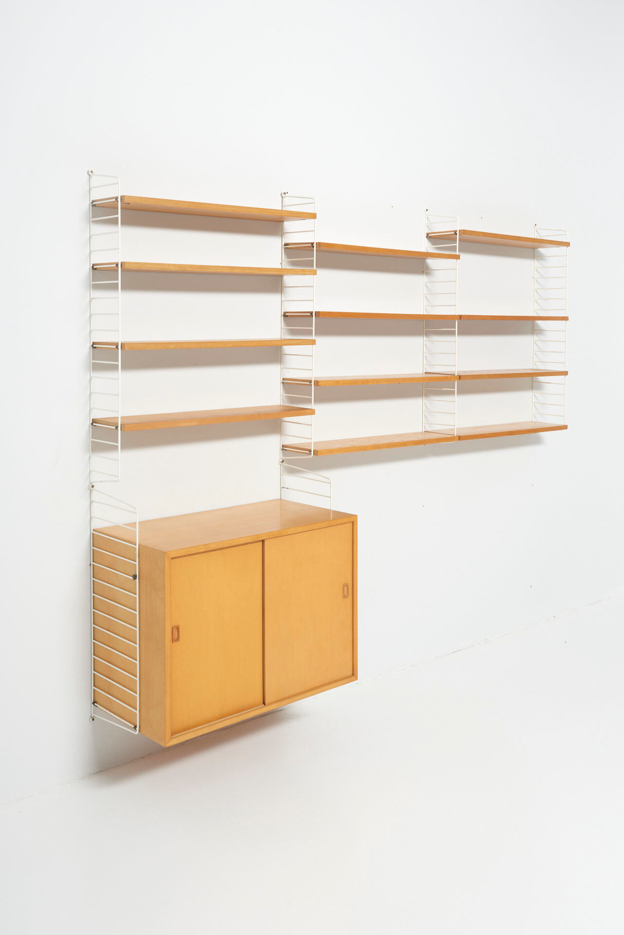 String wall system in ash by Nisse Strinning, Sweden 1950