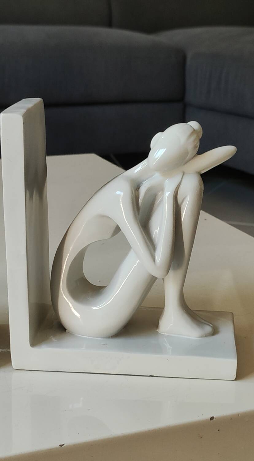 Paire de serre-livres figurines féminines