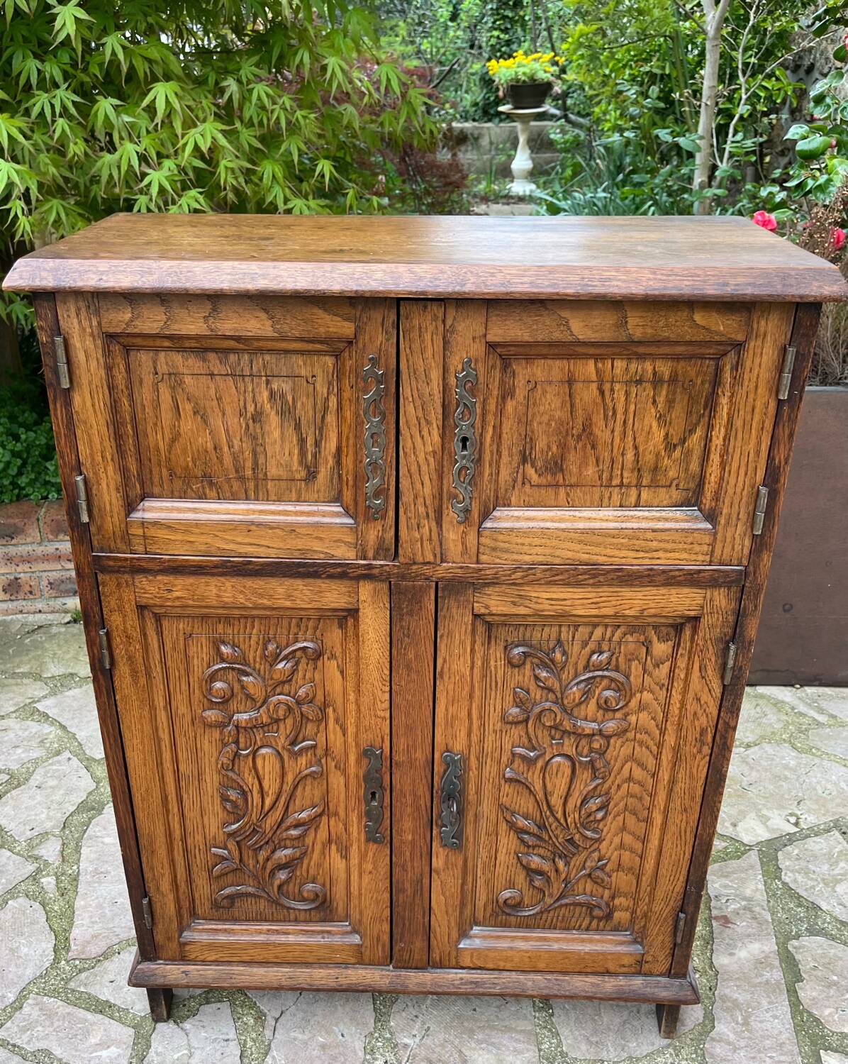 Low carved wooden sideboard