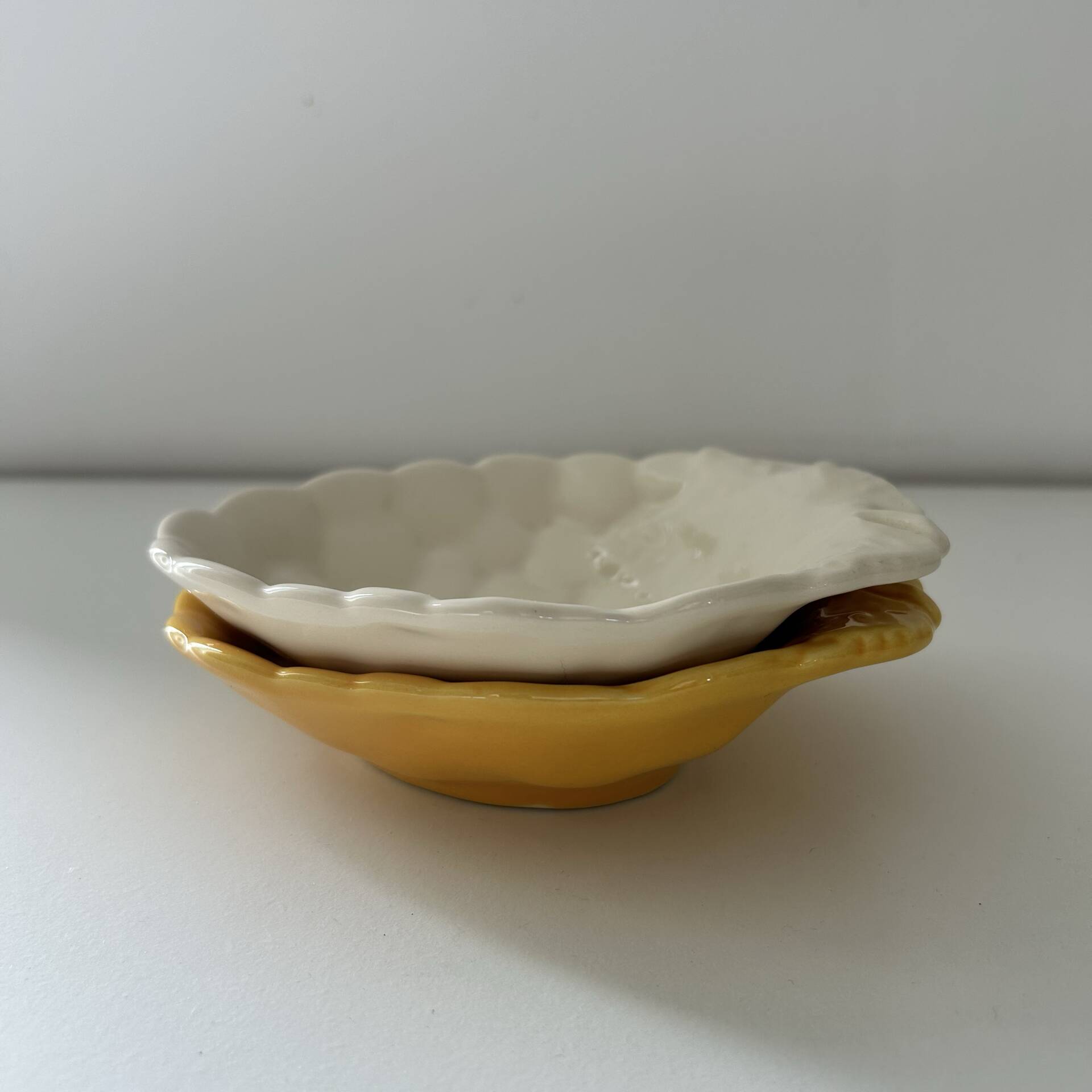 2 grape bowls in slipware