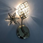 Pair of vintage floral wall sconces in gold metal and tassel