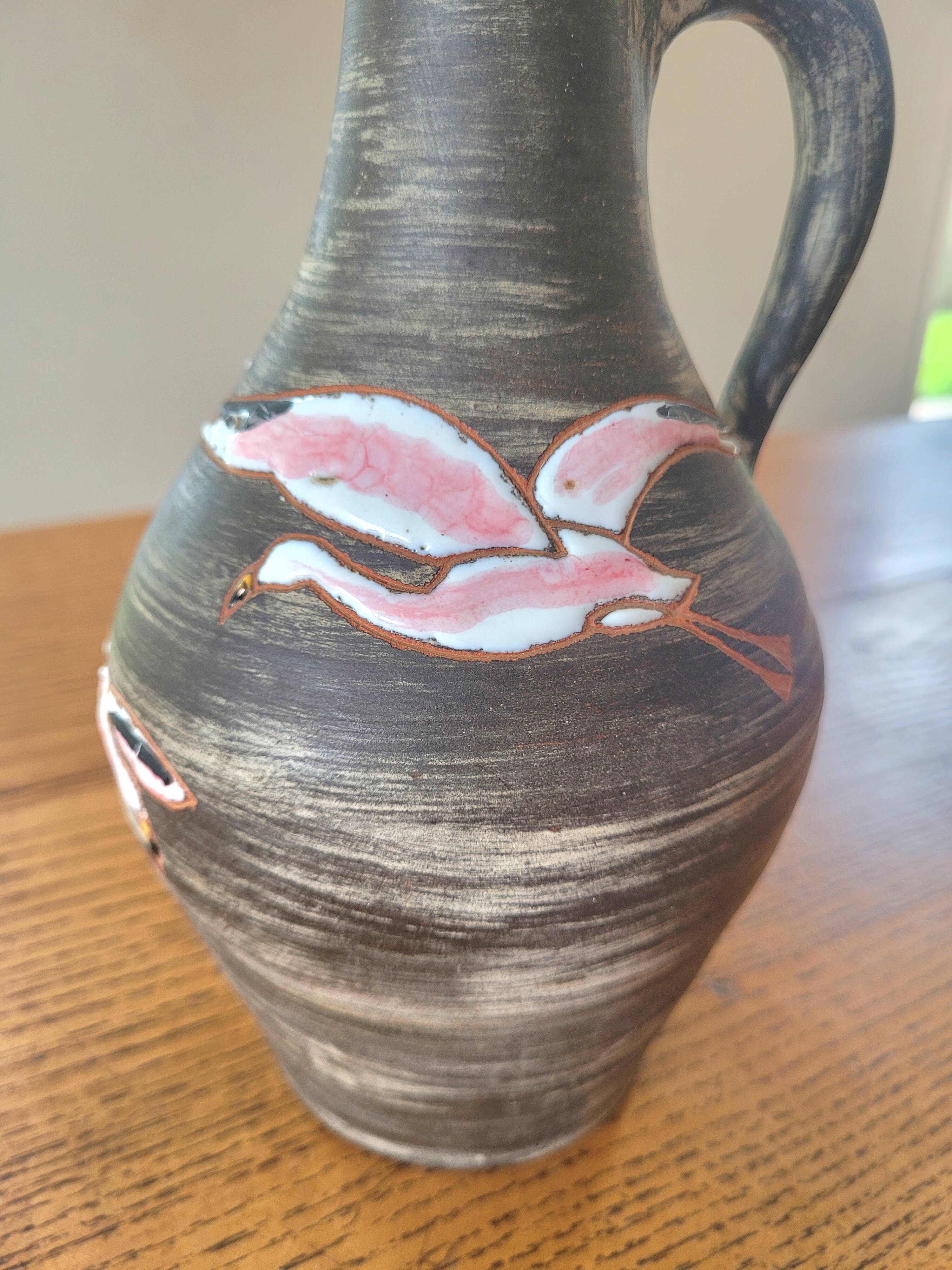 Rare signed ceramic and enameled porcelain pitcher