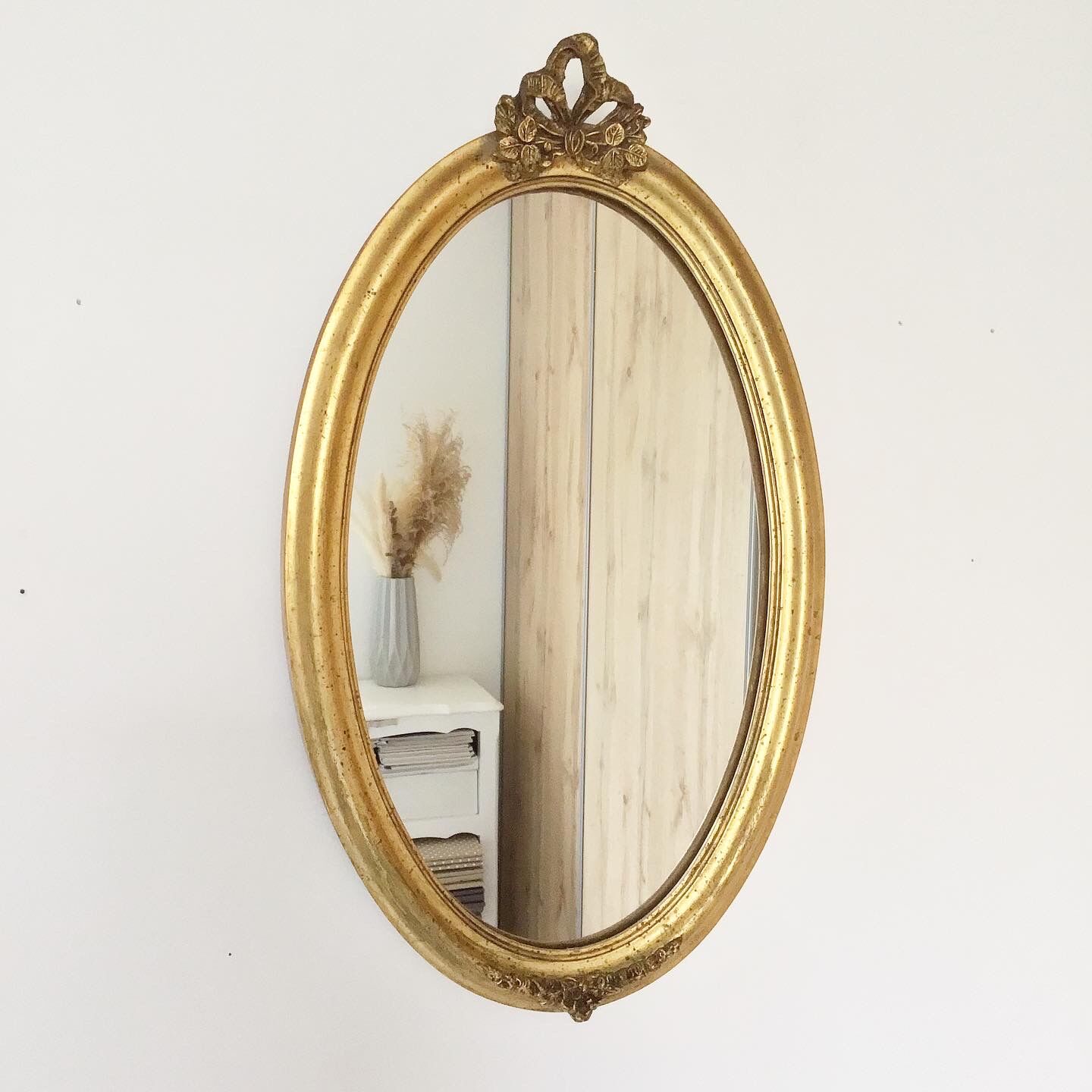 Vintage oval gilded mirror