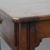 Antique French farmhouse dining table with two drawers and a pull-out board