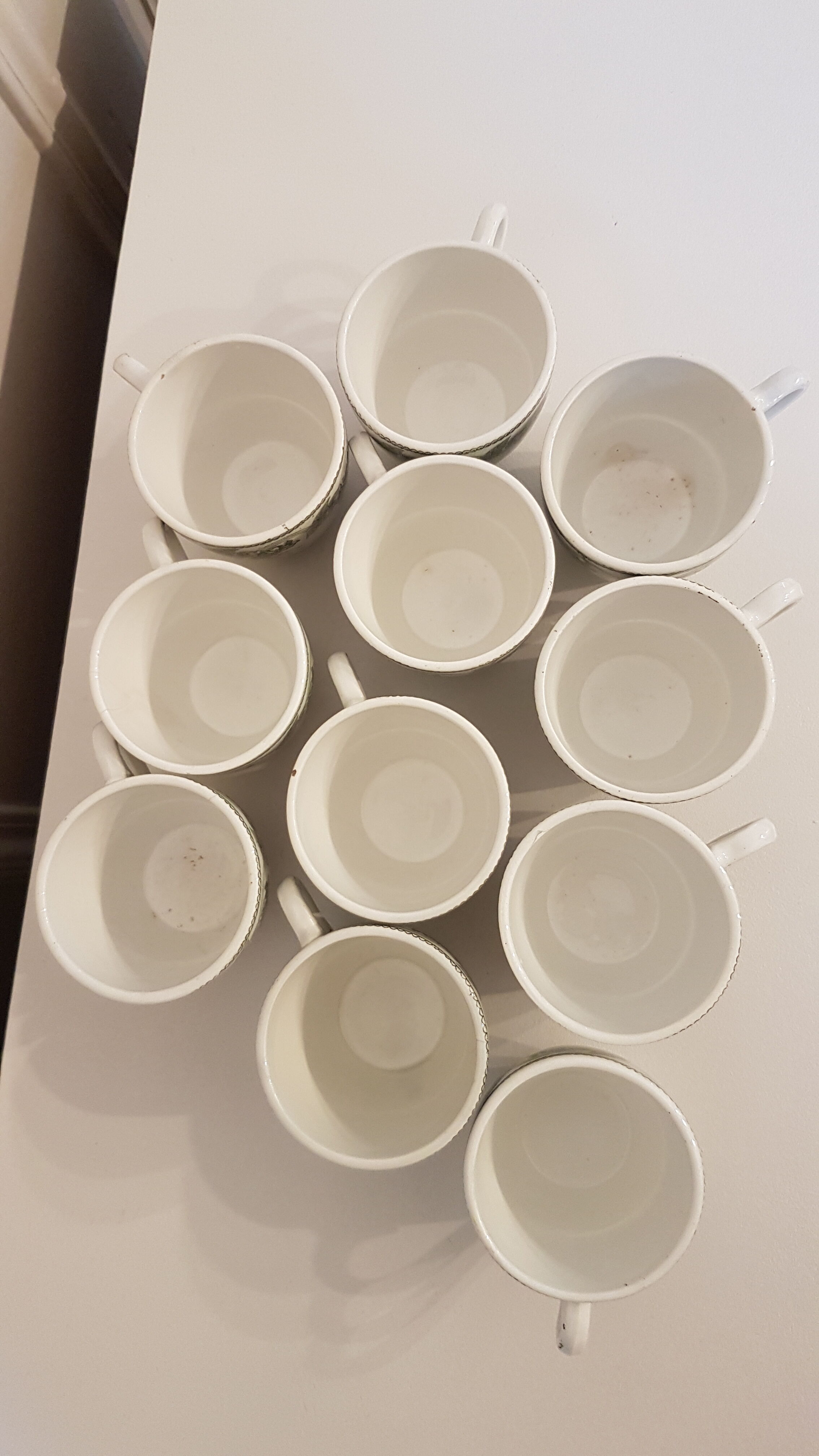 Set of 11 porcelain cups