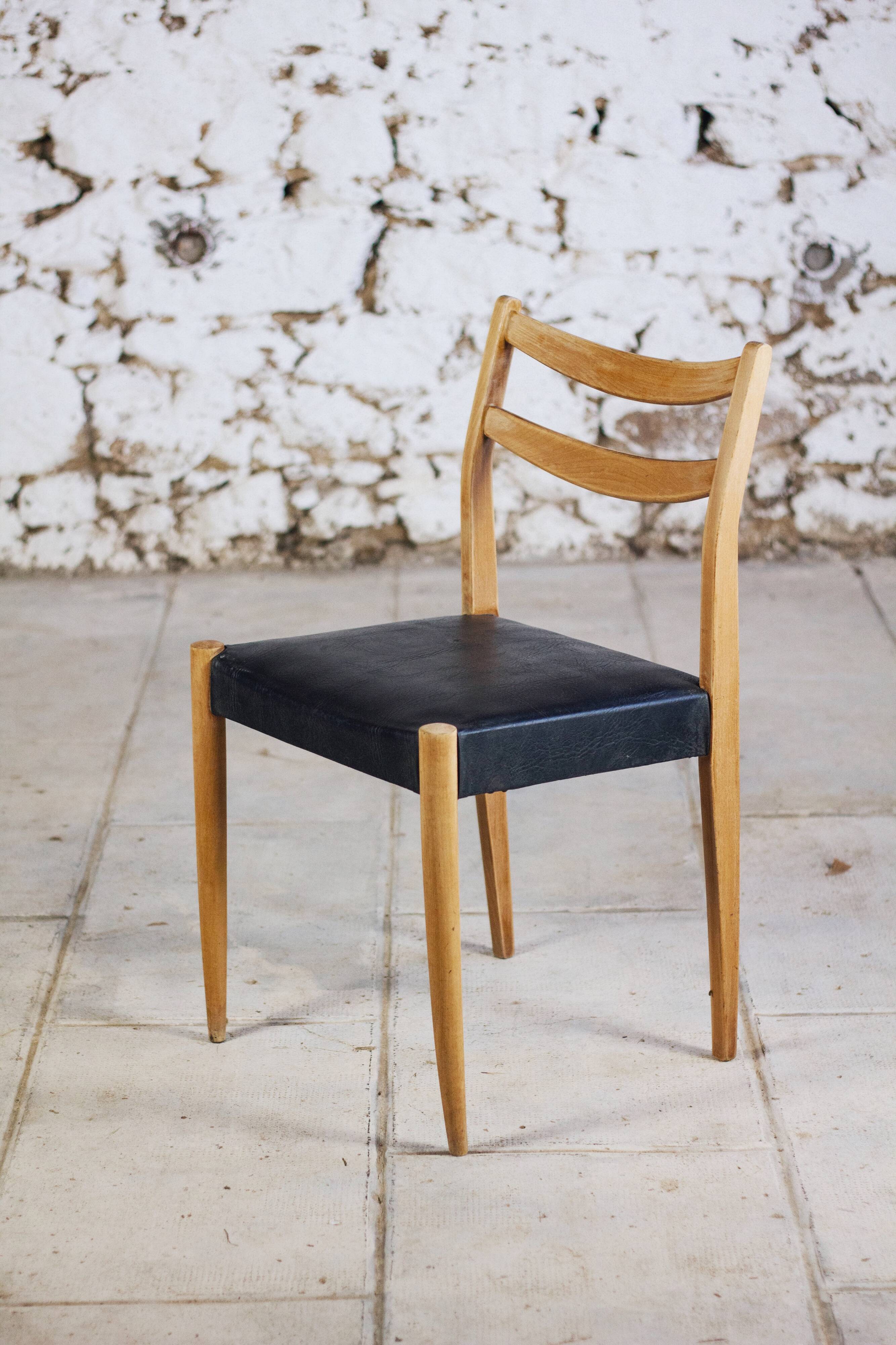 Scandinavian chair in teak and faux leather, 1960.