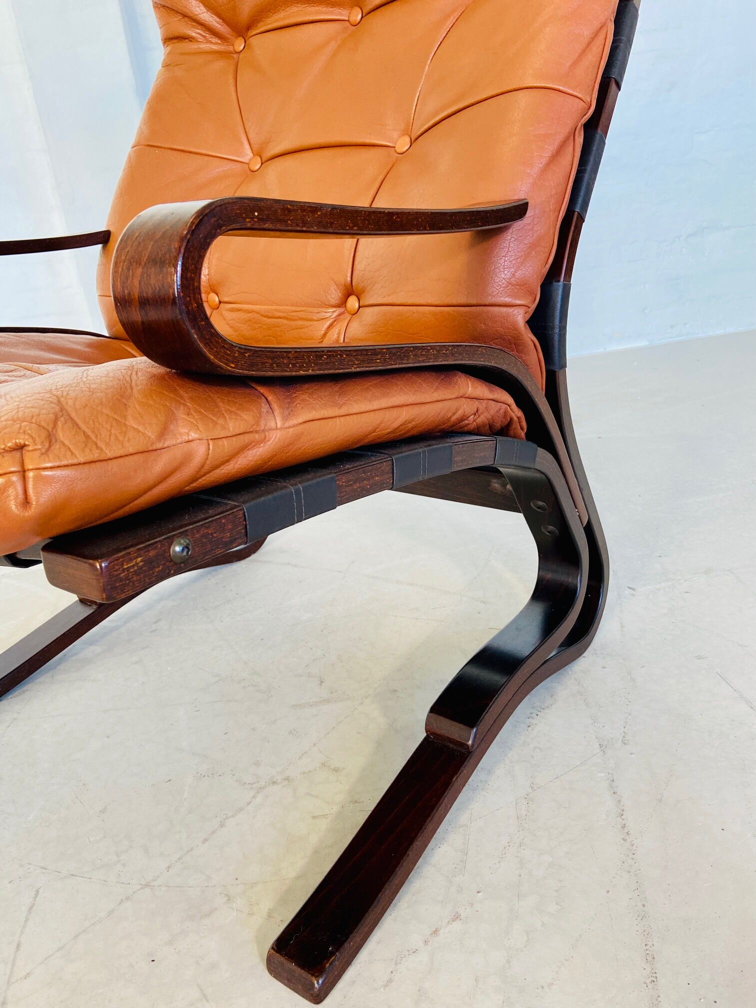 Vintage Scandinavian cognac lounge chair by Oddvin Rykken
